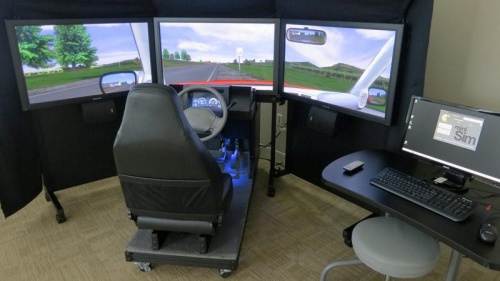The miniSim™ Driving Simulator with Quarter Cab, and Operator Display.
